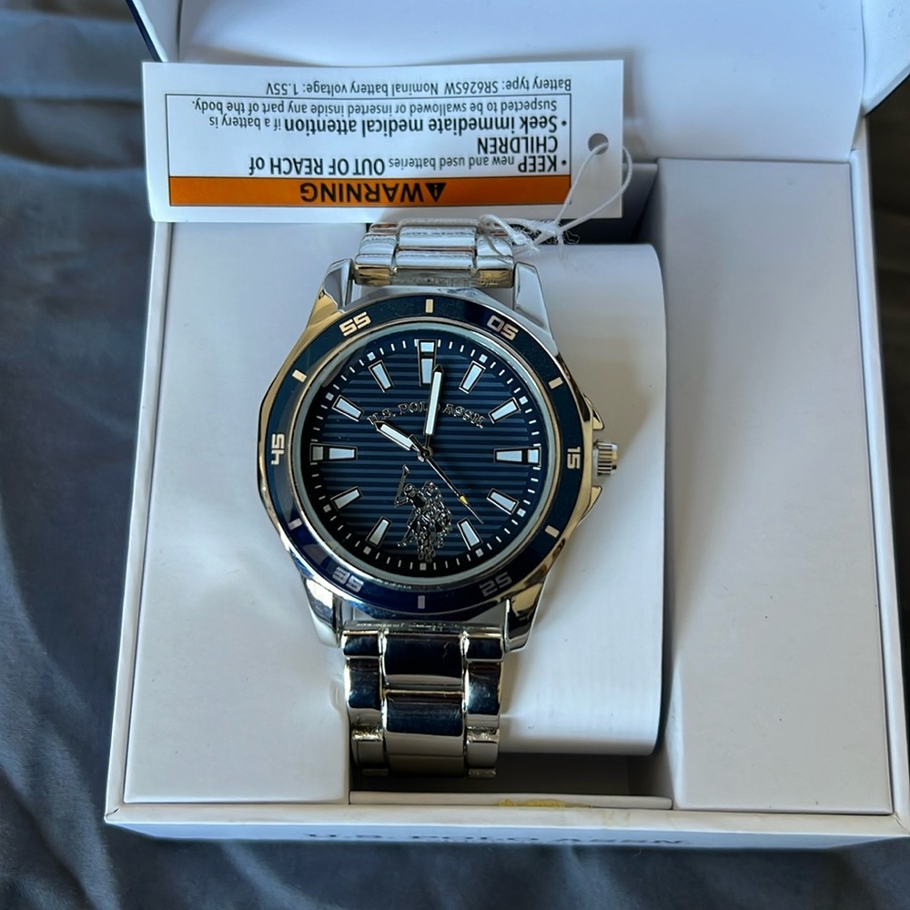 U.S. Polo Assn. watch. Never used, still attached to box.
